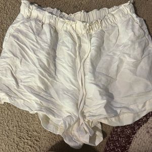 L white shorts